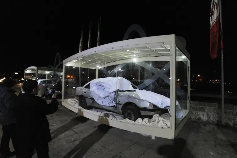 A car damaged at the explosion scene.